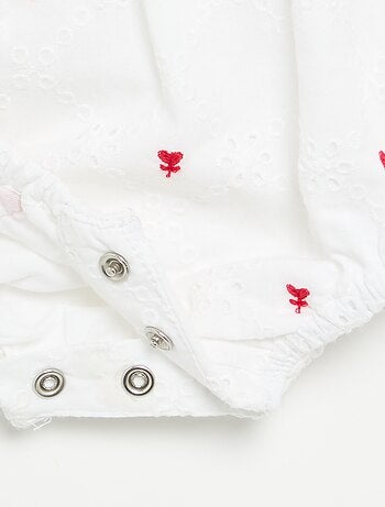Mouwloze romper met borduursels