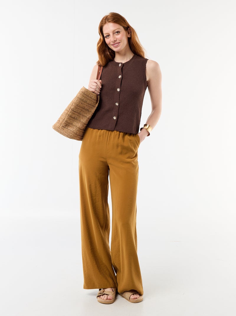 Mouwloze top met goudkleurige knopen Bruin - Kiabi