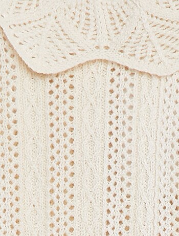 Mouwloze trui met tricot en kraagje