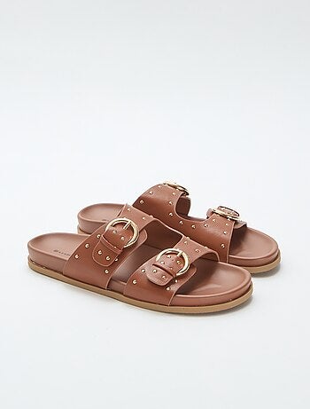 Mules met banden en goudkleurige gespen