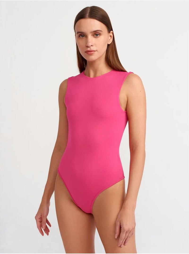 Naadloze mouwloze slim-fit unitard dilvin Fluorroze/Solinotes - Kiabi
