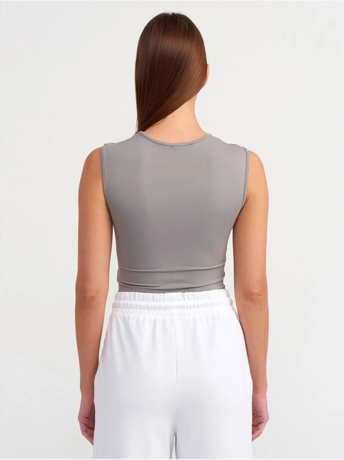 Naadloze mouwloze slim-fit unitard dilvin - Kiabi