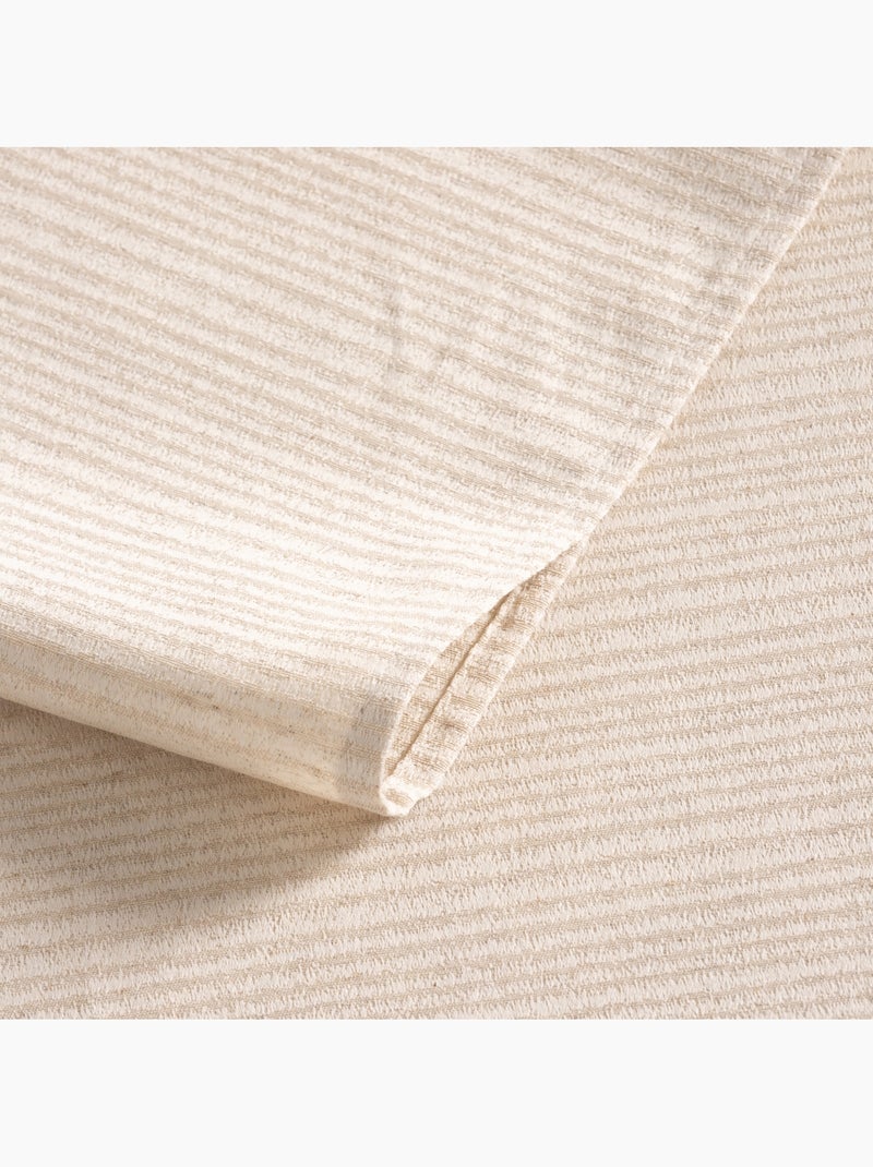 Nappe antitache avec tissu texturé à fines rayures - Gamusi. Beige - Kiabi