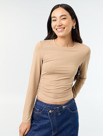 Nauwsluitend en geplooid T-shirt