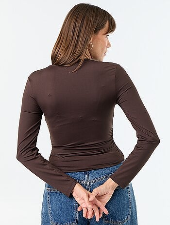 Nauwsluitend en geplooid T-shirt
