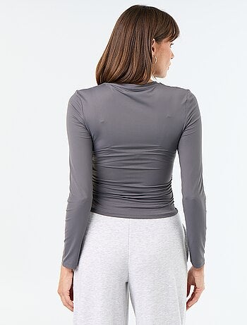 Nauwsluitend en geplooid T-shirt