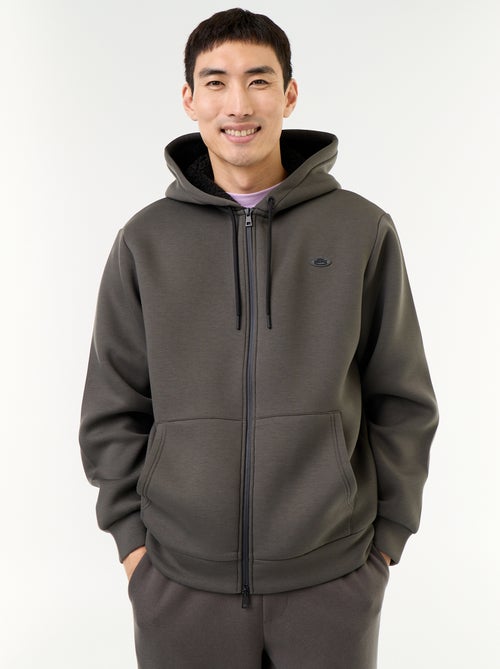 Neopreen sweatvest met rits en capuchon - Kiabi Neopreen sweatvest met rits en capuchon - Kiabi