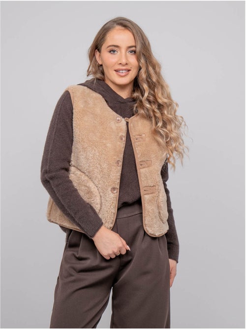 Omkeerbaar mouwloos gilet in lammy-look upokia - Kiabi Omkeerbaar mouwloos gilet in lammy-look upokia - Kiabi