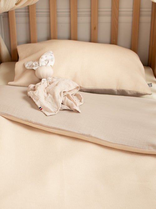 Omkeerbare dekbedovertrekset voor baby van katoengaze | sevira kids - Kiabi Omkeerbare dekbedovertrekset voor baby van katoengaze | sevira kids - Kiabi