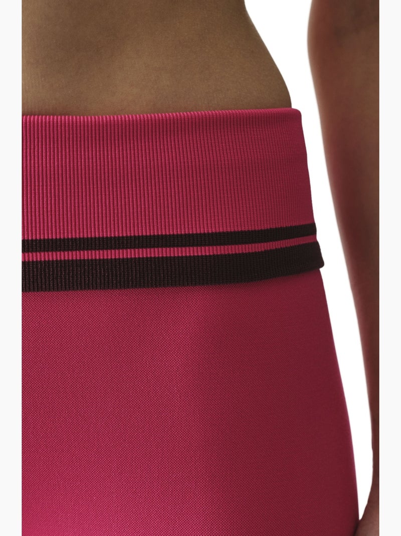 Opvouwbare legging met hoge taille penti Fluorroze/Solinotes - Kiabi