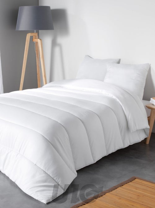 Oreiller uni confort en polyester - Kiabi Oreiller uni confort en polyester - Kiabi