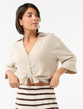 Oversized blouse met knoopdetail
