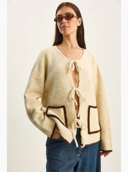 Oversized gebreid vest met striksluiting lucci - Kiabi Oversized gebreid vest met striksluiting lucci - Kiabi