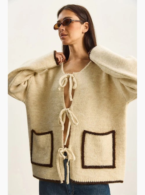 Oversized gebreid vest met striksluiting lucci - Kiabi Oversized gebreid vest met striksluiting lucci - Kiabi