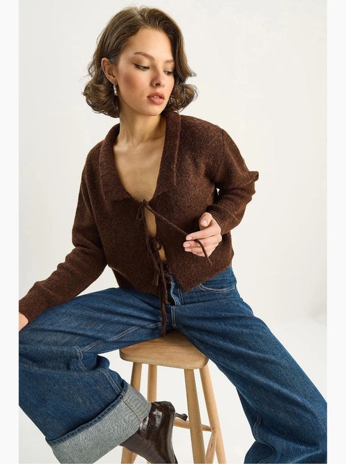 Oversized ribgebreid vest met v-hals en striksluiting lucci - Kiabi