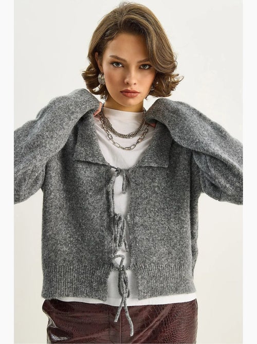 Oversized ribgebreid vest met v-hals en striksluiting lucci - Kiabi