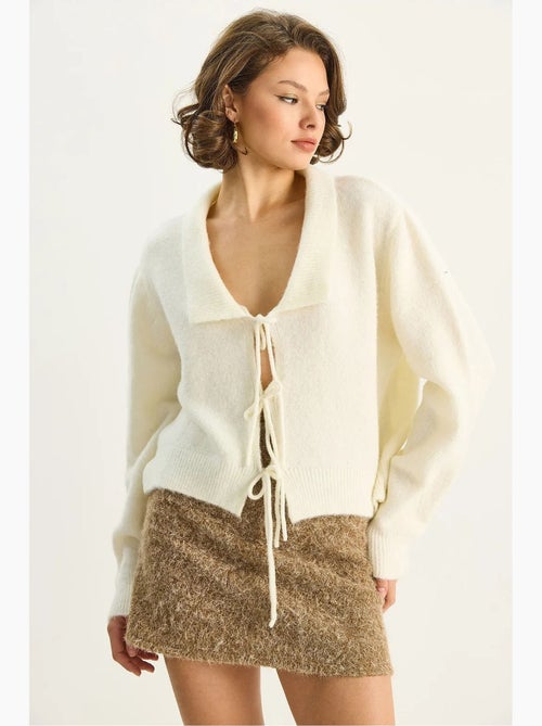 Oversized ribgebreid vest met v-hals en striksluiting lucci - Kiabi