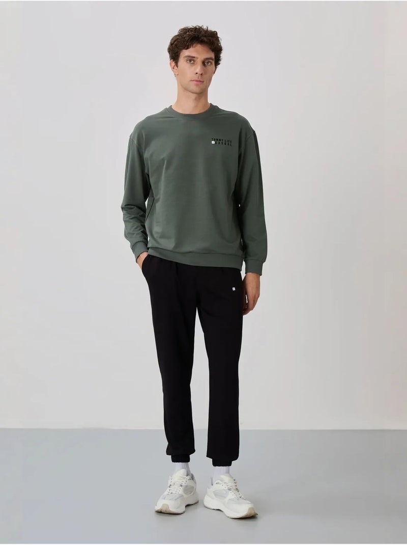Oversized sweatshirt- en broekset met ronde hals tommy Donkergroen - Kiabi