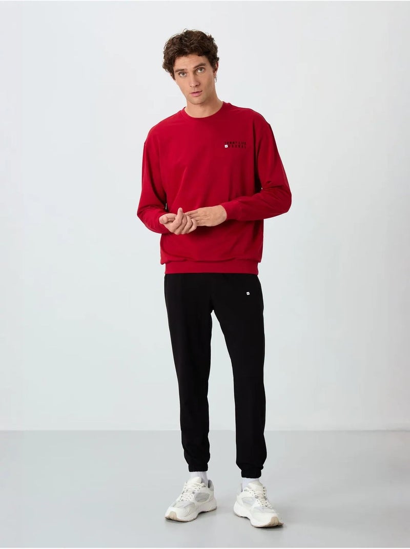 Oversized sweatshirt- en broekset met ronde hals tommy Rood - Kiabi