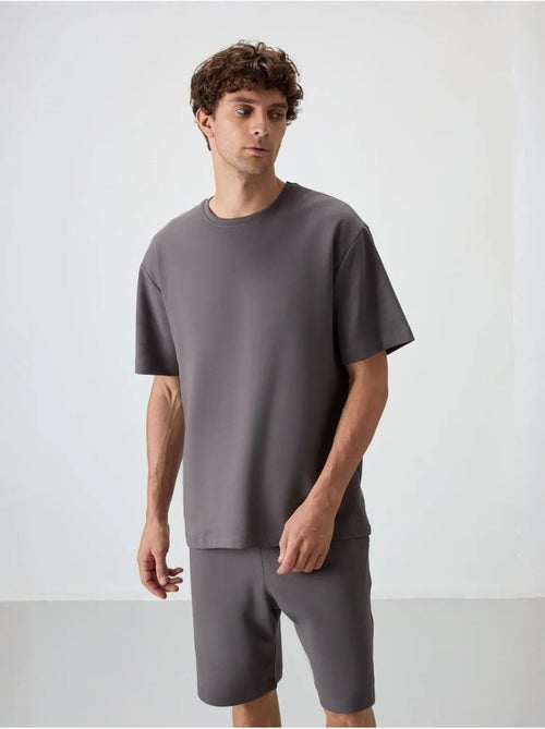 Oversized t-shirt- en shortset tommy - Kiabi Oversized t-shirt- en shortset tommy - Kiabi