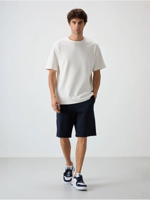 Oversized t-shirt- en shortset tommy - Kiabi Oversized t-shirt- en shortset tommy - Kiabi