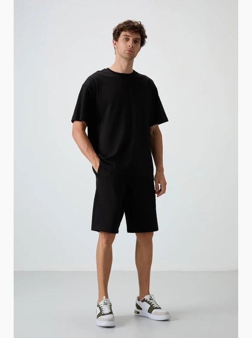 Oversized t-shirt- en shortset tommy - Kiabi Oversized t-shirt- en shortset tommy - Kiabi