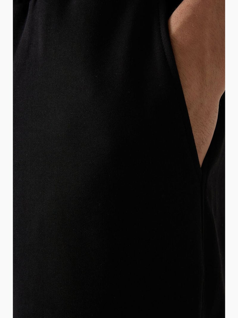 Oversized t-shirt- en shortset tommy Zwart - Kiabi