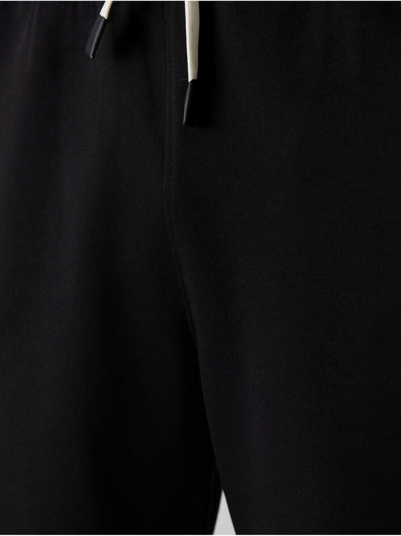 Oversized t-shirt- en shortset tommy Zwart - Kiabi
