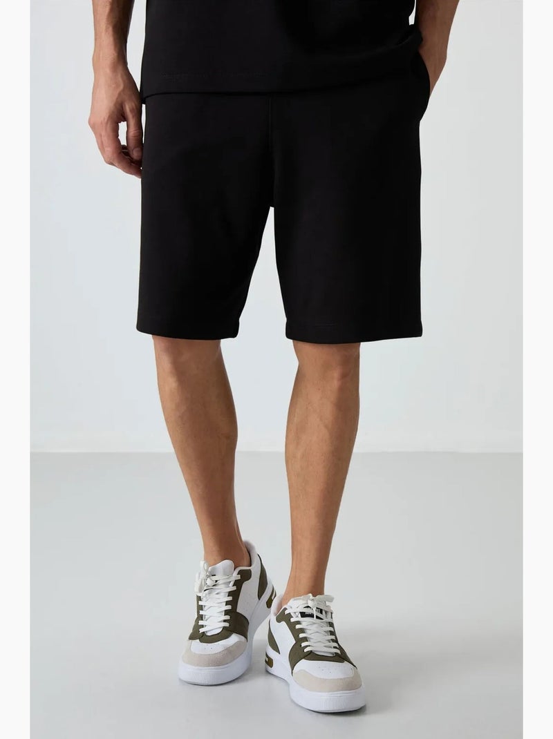 Oversized t-shirt- en shortset tommy Zwart - Kiabi