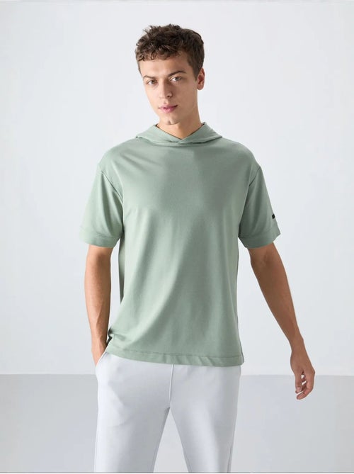 Oversized t-shirt met capuchon en korte mouwen tommy - Kiabi Oversized t-shirt met capuchon en korte mouwen tommy - Kiabi