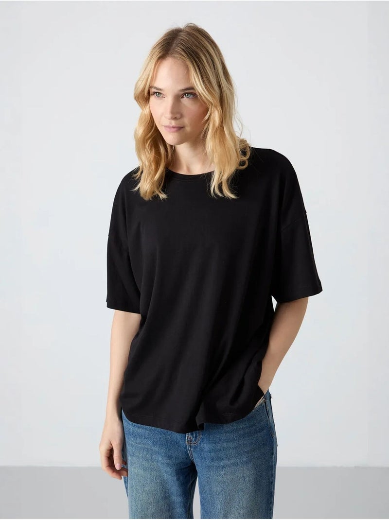 Oversized t-shirt van katoen en modal met ronde hals tommy Zwart - Kiabi