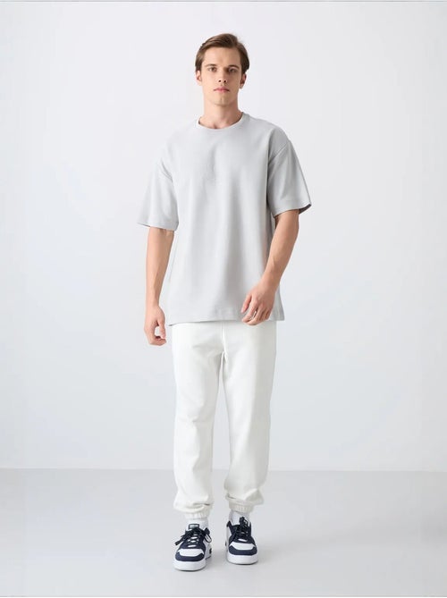 Oversized t-shirt van katoenmix met ronde hals tommy - Kiabi Oversized t-shirt van katoenmix met ronde hals tommy - Kiabi