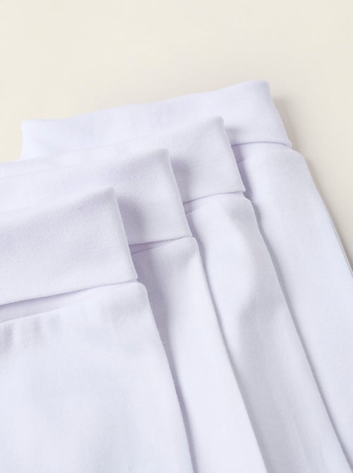 Pack 4 pantalons à pieds en coton - Kiabi
