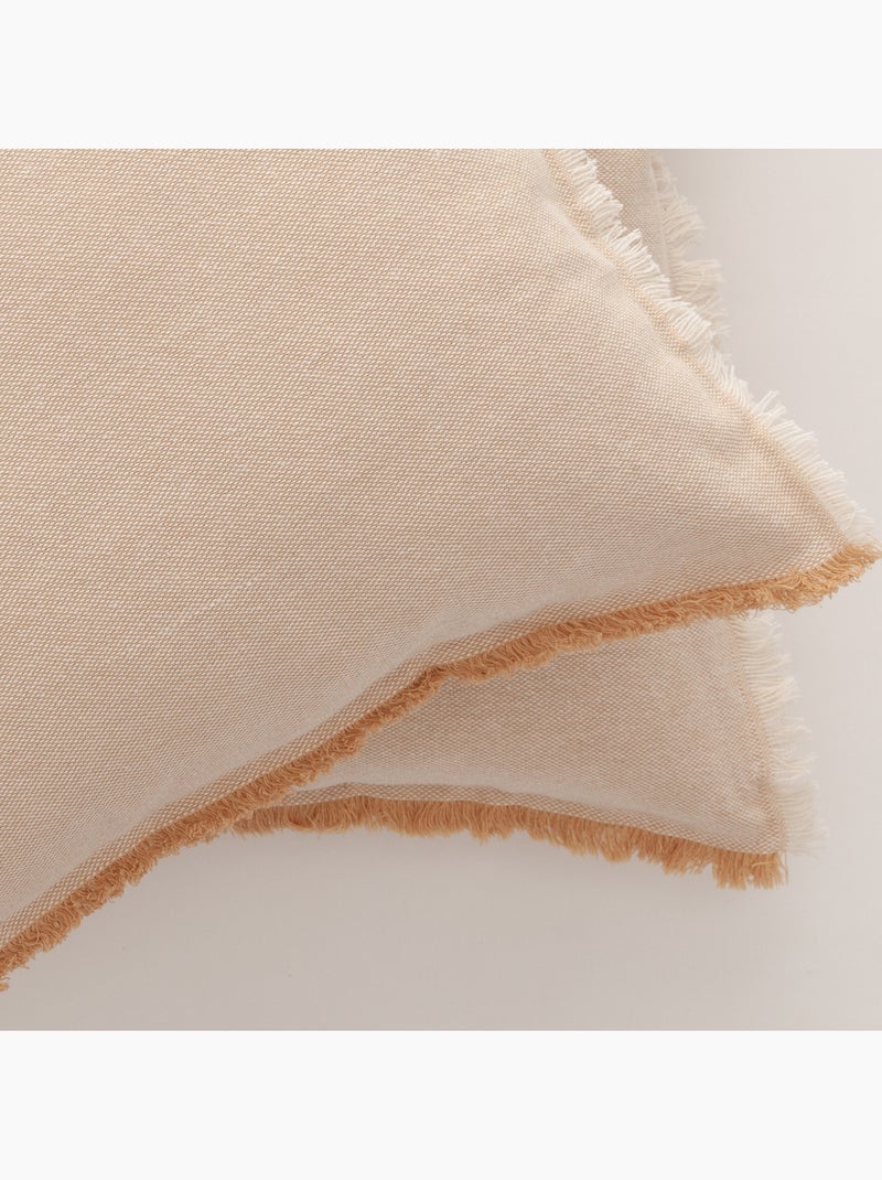 Pack de deux housses de coussin unies en tissu texturé en relief, avec franges -  Gamusi. Beige - Kiabi