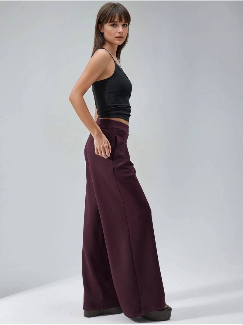 Palazzo-broek met elastische taille en plooien busem Bordeauxrood - Kiabi