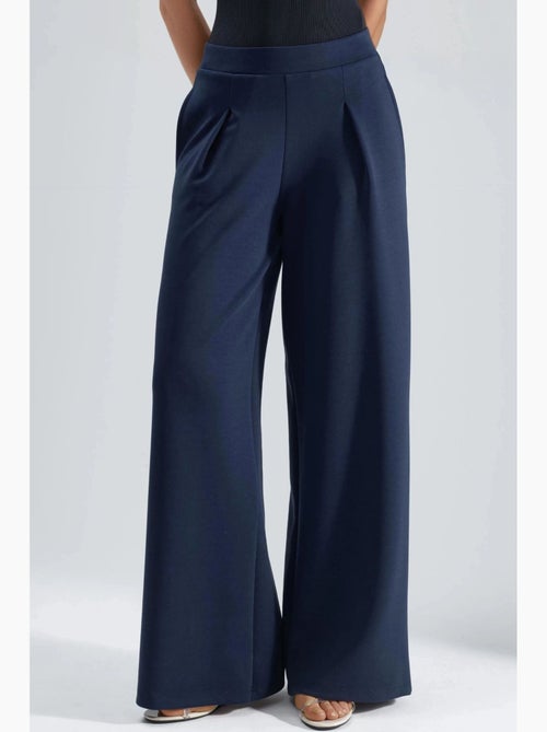 Palazzo-broek met elastische taille en plooien busem - Kiabi Palazzo-broek met elastische taille en plooien busem - Kiabi