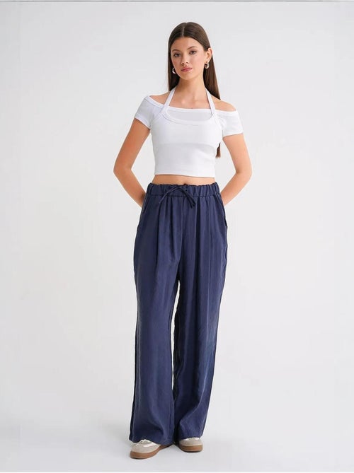 Palazzo-broek met hoge taille van modal met plooien en trekkoord mixray - Kiabi Palazzo-broek met hoge taille van modal met plooien en trekkoord mixray - Kiabi