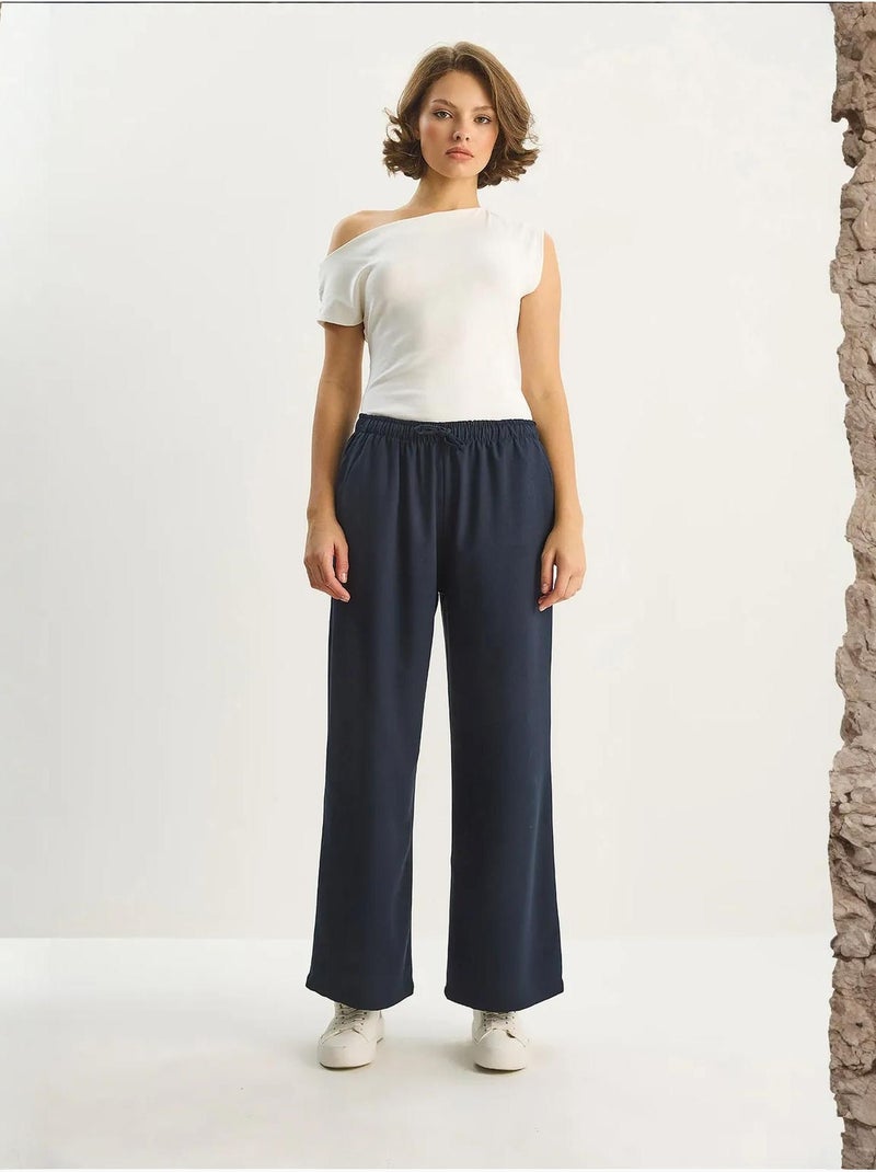 Palazzo-broek met wijde pijpen en striksluiting lucci Marineblauw - Kiabi