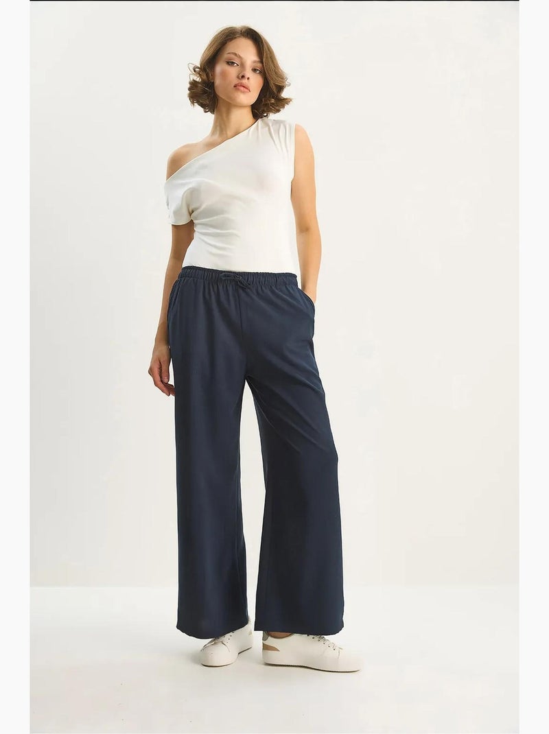 Palazzo-broek met wijde pijpen en striksluiting lucci Marineblauw - Kiabi