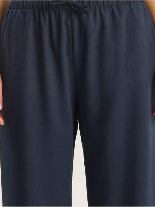 Palazzo-broek met wijde pijpen en striksluiting lucci - Kiabi Palazzo-broek met wijde pijpen en striksluiting lucci - Kiabi