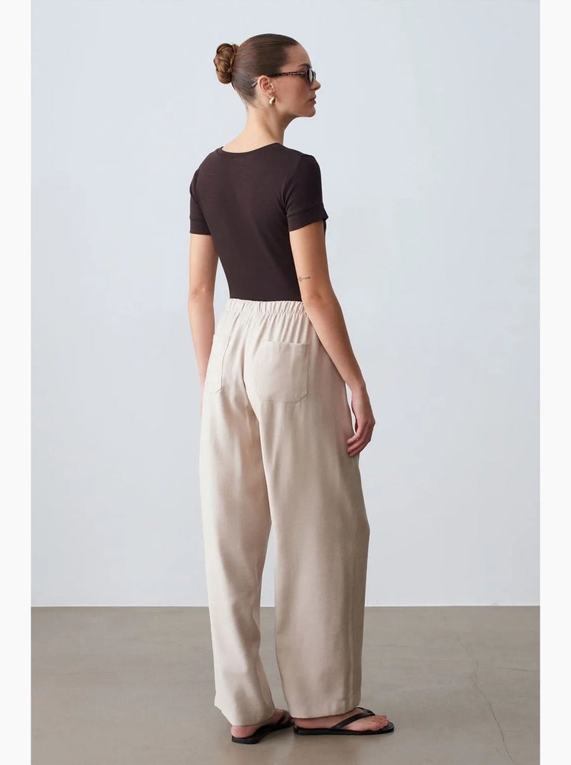 Pantalon à jambe large avec taille élastique et cordon dilvin Sable - Kiabi