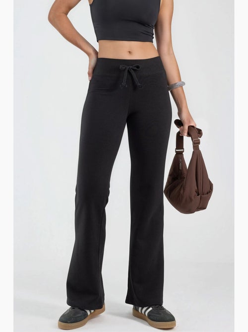 Pantalon à jambes évasées avec taille élastique busem - Kiabi Pantalon à jambes évasées avec taille élastique busem - Kiabi