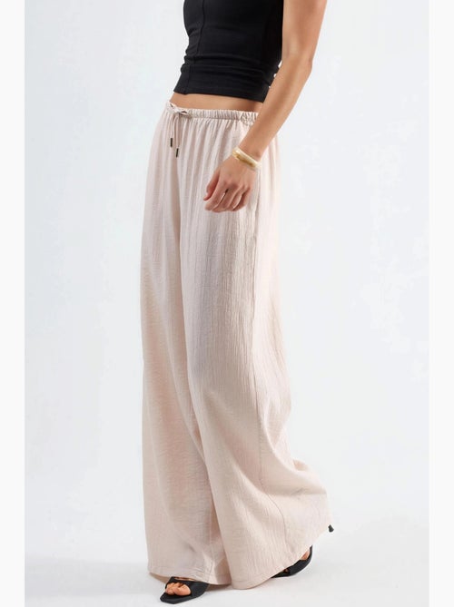 Pantalon à jambes larges et taille élastiquée avec cordon de serrage et poches busem - Kiabi