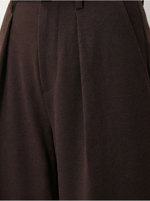 Pantalon à jambes larges plissé et ceinturé istanbul - Kiabi Pantalon à jambes larges plissé et ceinturé istanbul - Kiabi