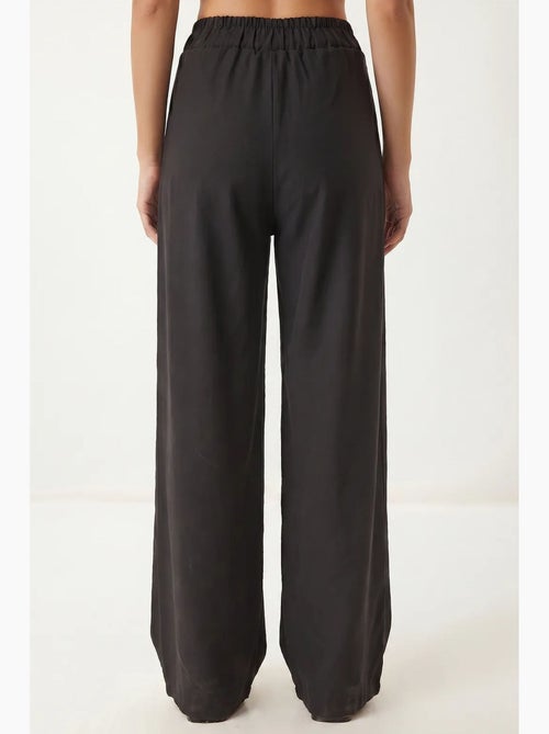Pantalon ample en crêpe à taille haute istanbul - Kiabi Pantalon ample en crêpe à taille haute istanbul - Kiabi