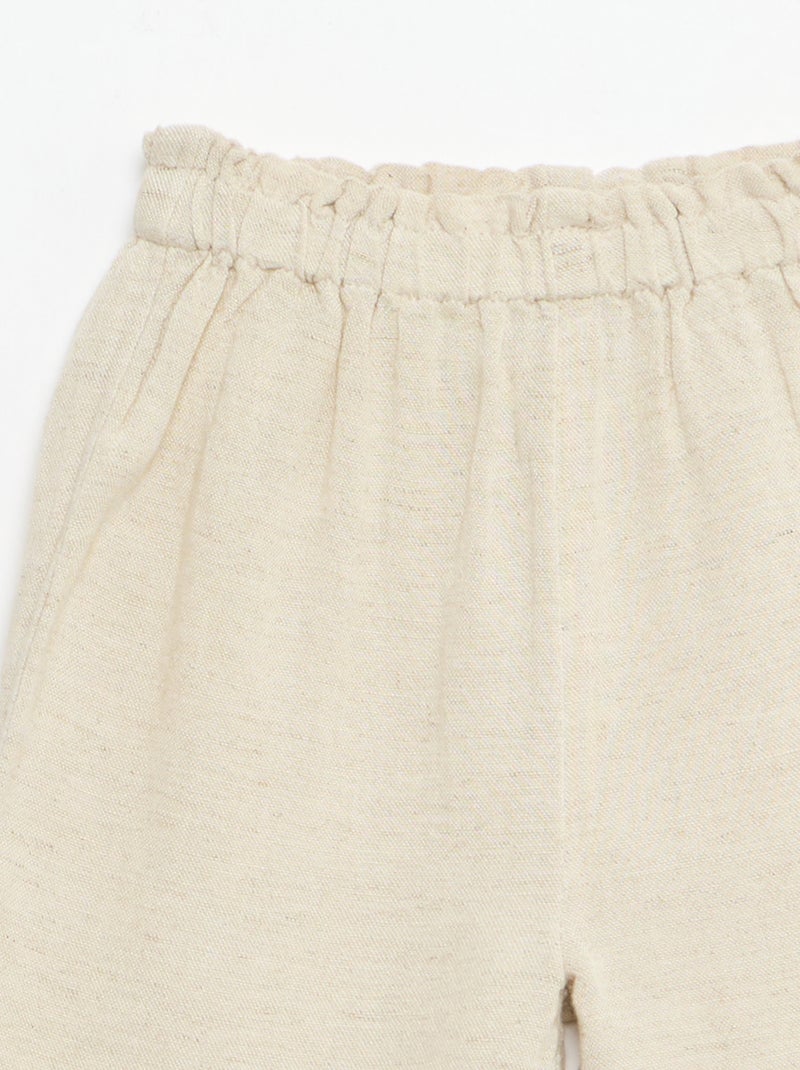 Pantalon avec volants en bas de jambe Beige - Kiabi