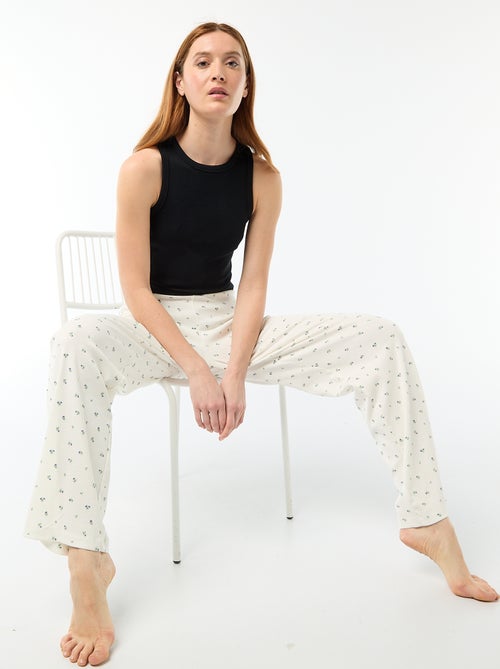 Pantalon côtelé de nuit all-over 'fleur' - Kiabi