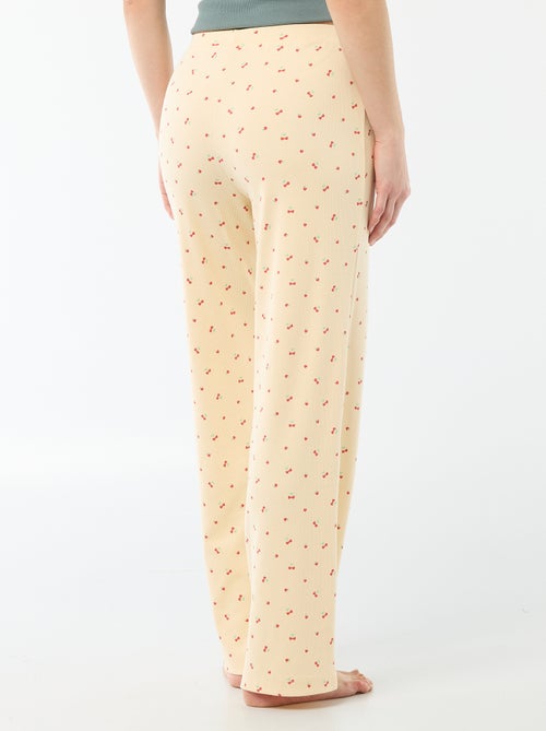 Pantalon côtelé de nuit all-over 'fleur' - Kiabi