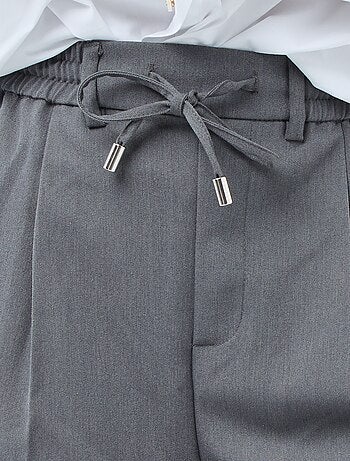 Pantalon coupe large à la taille élastiquée + liens à nouer