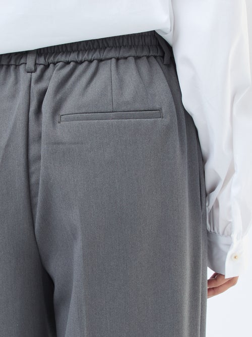 Pantalon coupe large à la taille élastiquée + liens à nouer - Kiabi